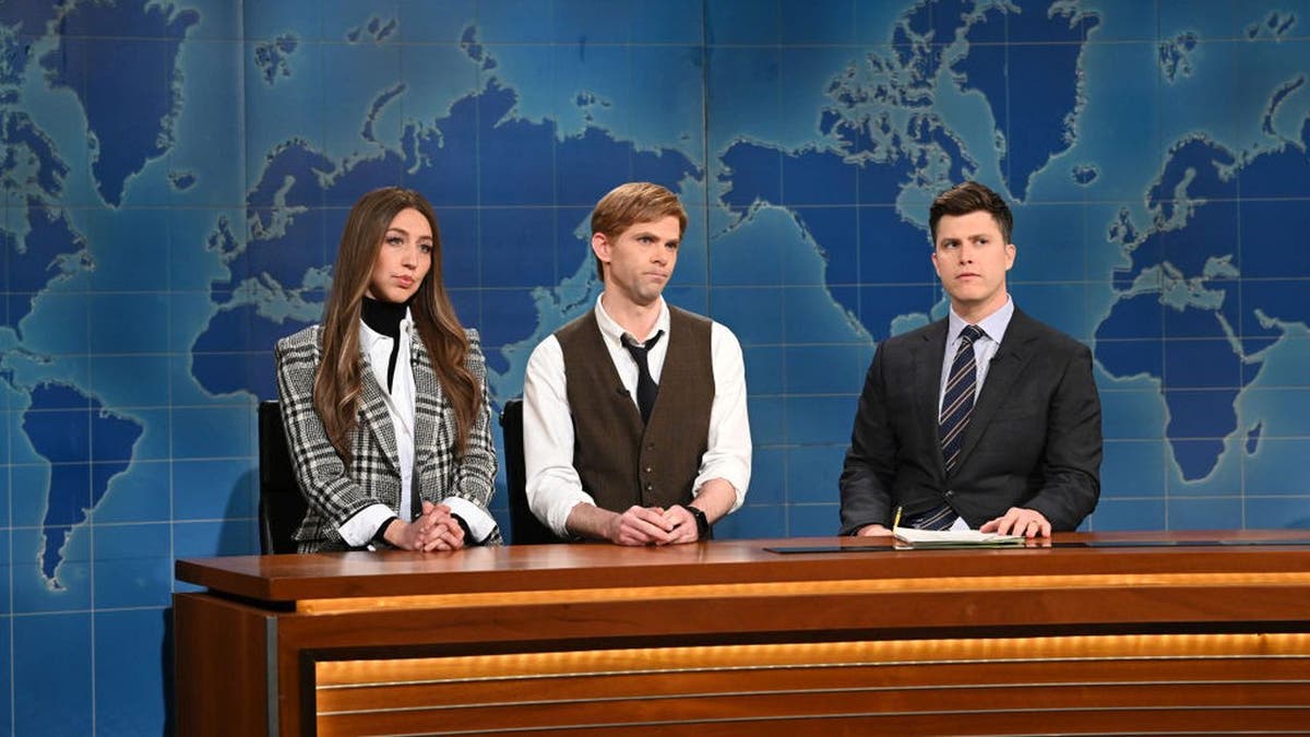 Pictured here is Heidi Gardner as Janet Noonan and Mikey Day as Lowell Fitzroy with anchor Colin Jost during "Saturday Night Live's" Weekend Update on Feb. 6. (Will Heath/NBC/NBCU Photo Bank via Getty Images/)