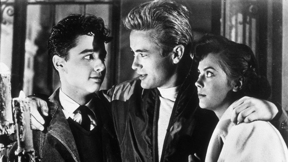 American actors Sal Mineo (1939 - 1976), James Dean (1931 - 1955) and Natalie Wood (1938 - 1981) in a still from director Nicholas Ray's film 'Rebel Without a Cause'.?