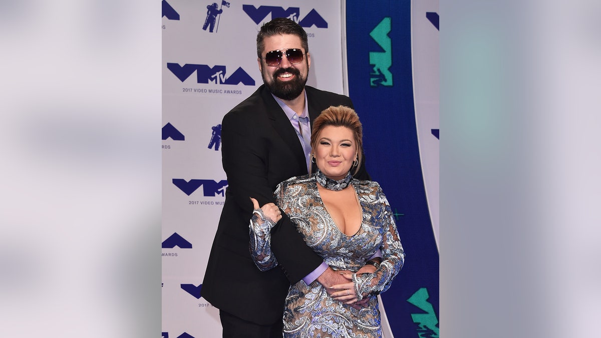 During happier times:  Andrew Glennon, left, and Amber Portwood attend the 2017 MTV Video Music Awards at The Forum on August 27, 2017, in Inglewood, Calif.