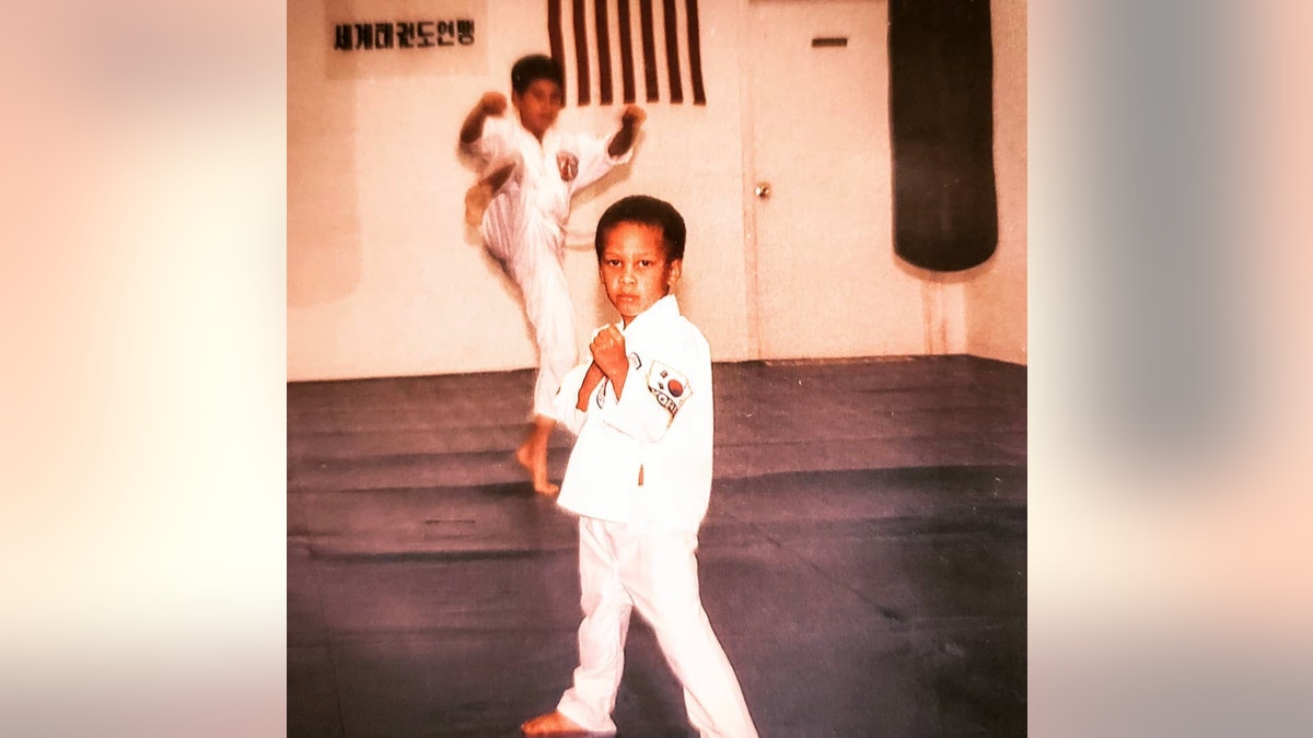 Nicholas Irving poses in martial arts class as child. (Nicholas Irving)