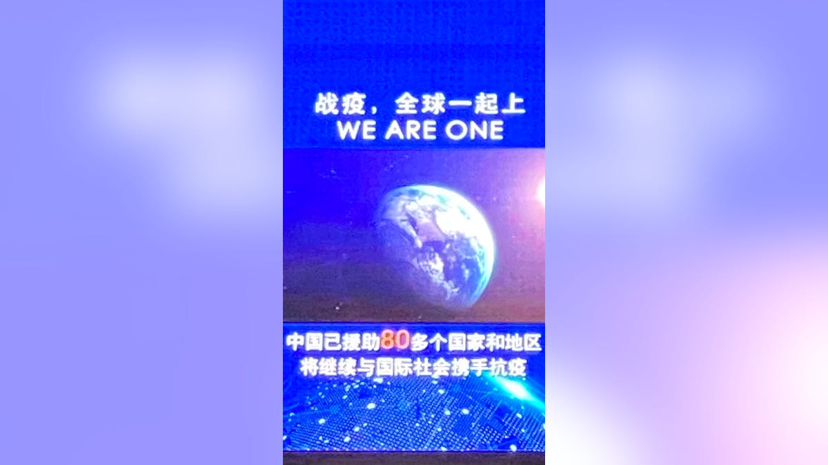 The bottom text reads: "China has helped more than 80 countries and territories, will continue to fight the virus hand in hand with the international community." (Fox News)