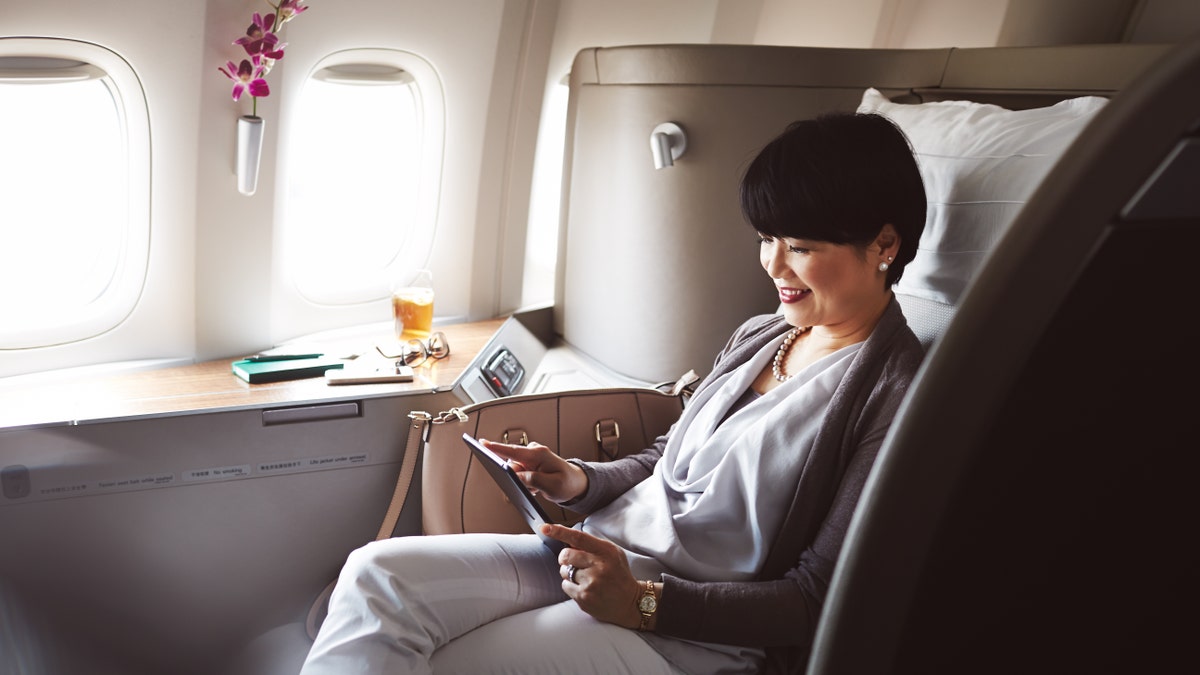 A passenger flying first-class with Cathay Pacific, pictured.