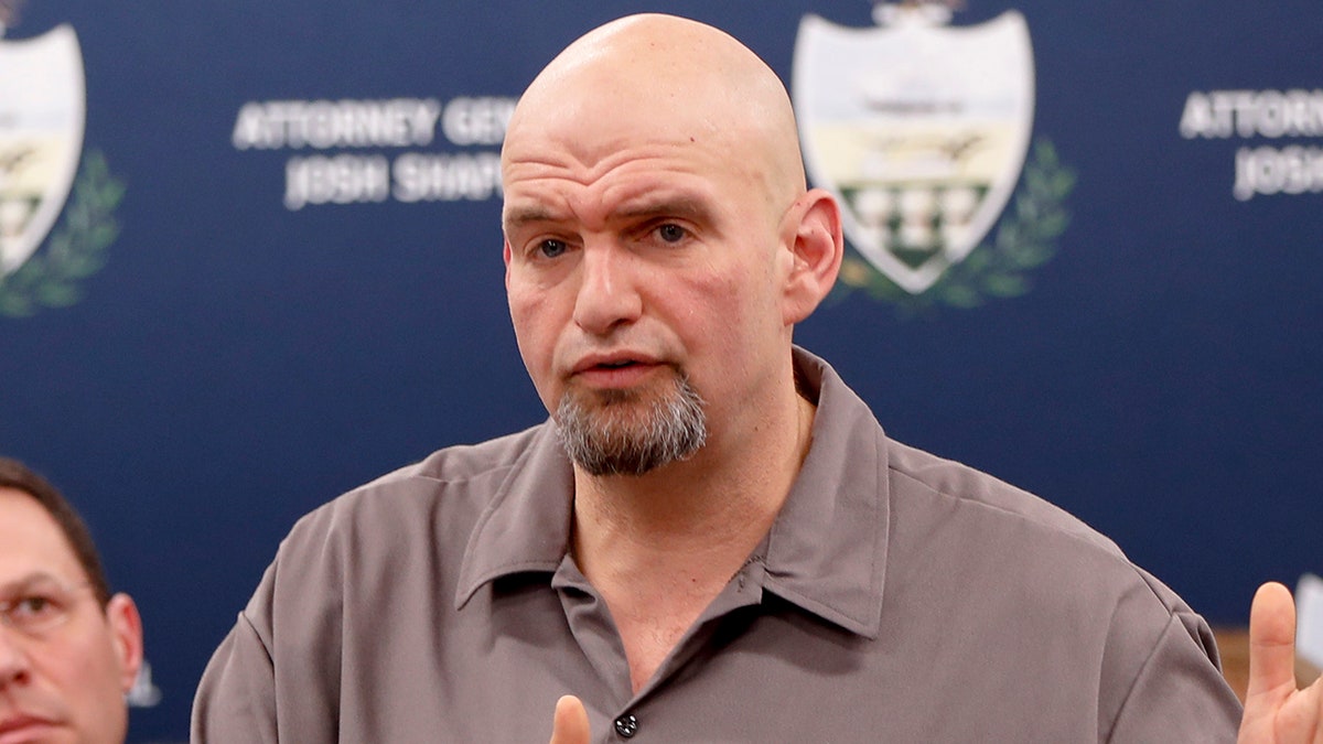 Pennsylvania Lieutenant Governor John Fetterman, right, speaks as he stands beside state Attorney General Josh Shapiro during a news conference about legal action in the dispute between health insurance providers UPMC and Highmark, Thursday, Feb. 7, 2019, in Pittsburgh. Fetterman will run for U.S. Senate, making the announcement Monday, Feb. 8, 2021 after kicking off an exploratory fundraising campaign last month that raised over $1 million. (AP Photo/Keith Srakocic)