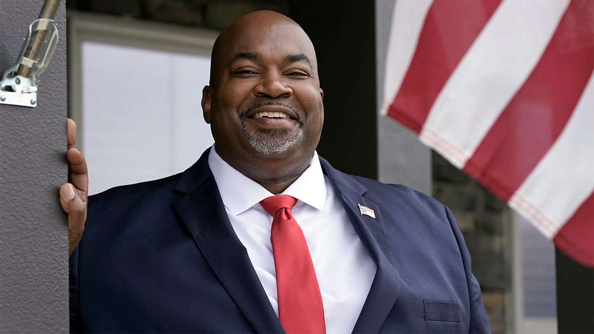 Then-North Carolina Lt. Gov-elect Mark Robinson is shown at his home in Colfax, N.C., Tuesday, Nov. 10, 2020. Robinson is North Carolina's first Black lieutenant governor. He hopes he can work with Democratic Gov. Roy Cooper and state lawmakers on veterans-related issues. (AP Photo/Gerry Broome)