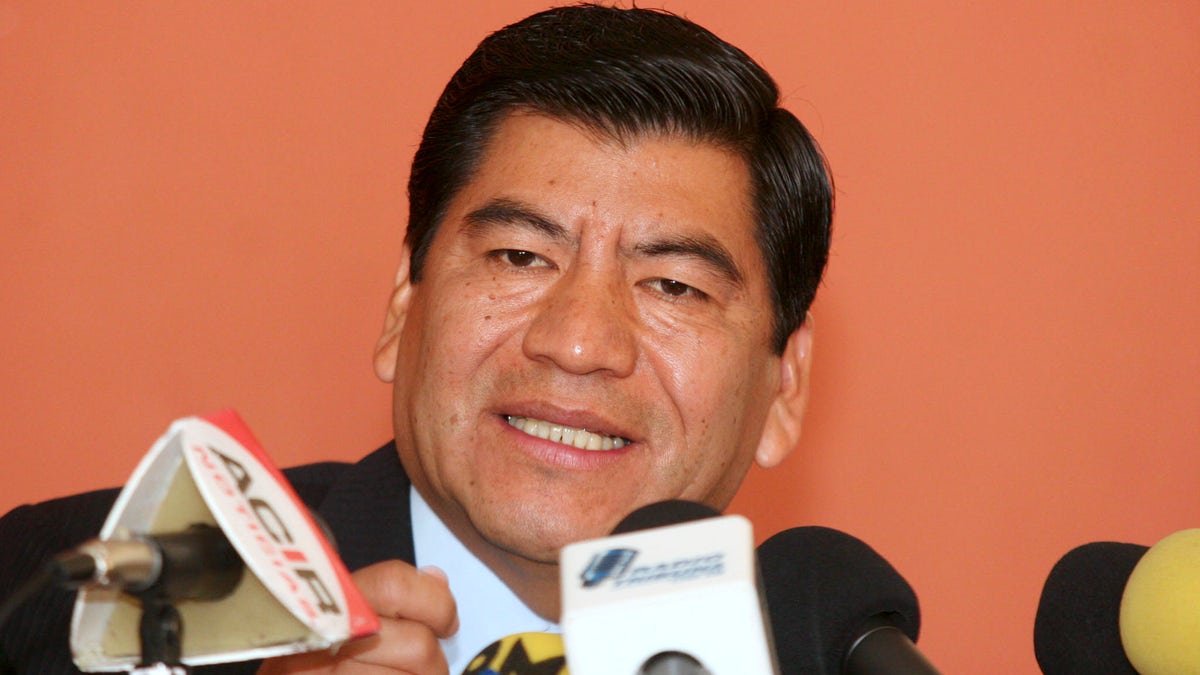 In this Feb. 15, 2006, file photo, the governor of the Mexican state of Puebla, Mario Marin, speaks during a news conference in Puebla, Mexico. Mexican authorities arrested on Feb. 3, 2021, the former governor on charges that he had a reporter who investigated his role in a pedophilia ring illegally arrested and tortured, an official said Thursday, Feb. 4, 2021. (AP Photo/Joel Merino, File)