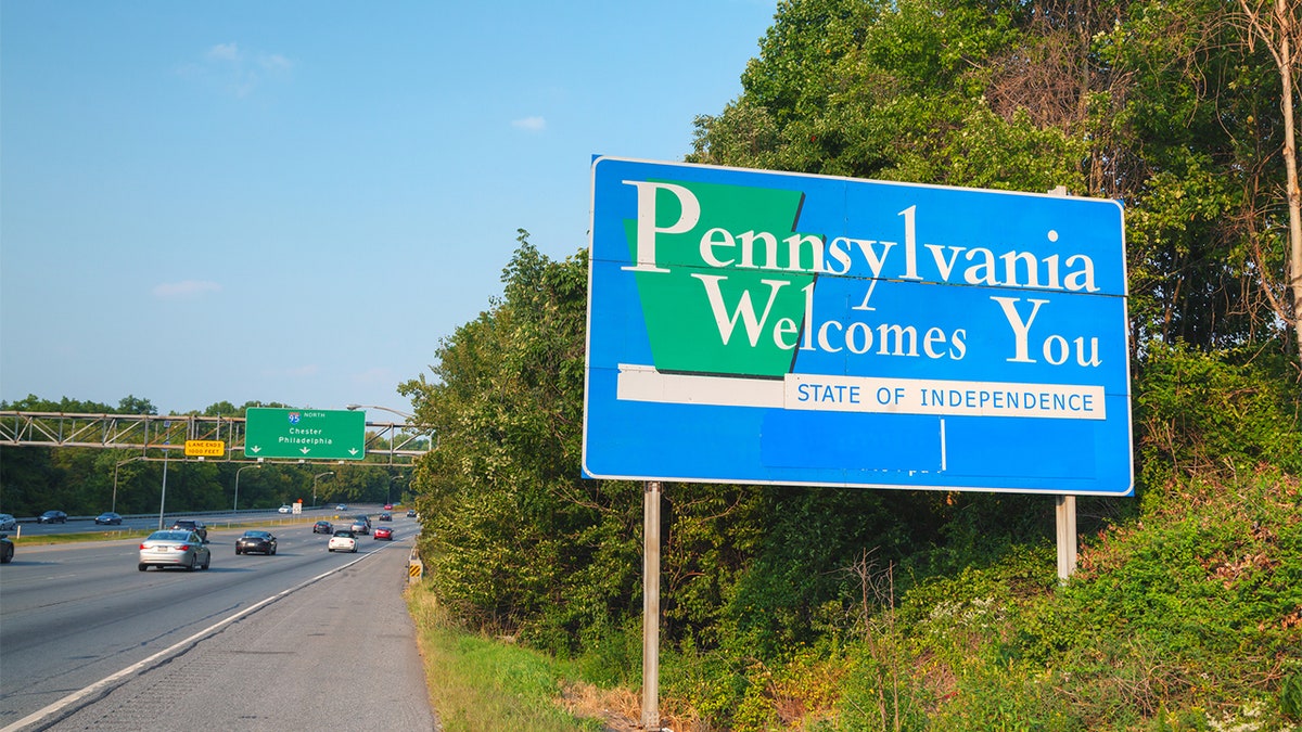 'Pennsylvania Welcomes You' road sign at the state border on Interstate 95 in Marcus Hook.
