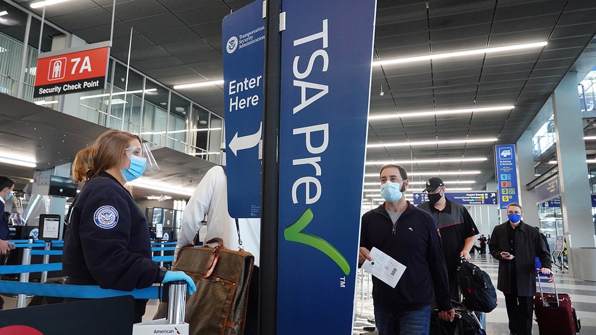 The Transportation Security Administration (TSA) on Friday issued an update to its recent mask mandate for travelers passing through security checkpoints, confirming that violators face fines ranging from $250 up to $1,500 for repeat offenders. (Photo by Scott Olson/Getty Images)