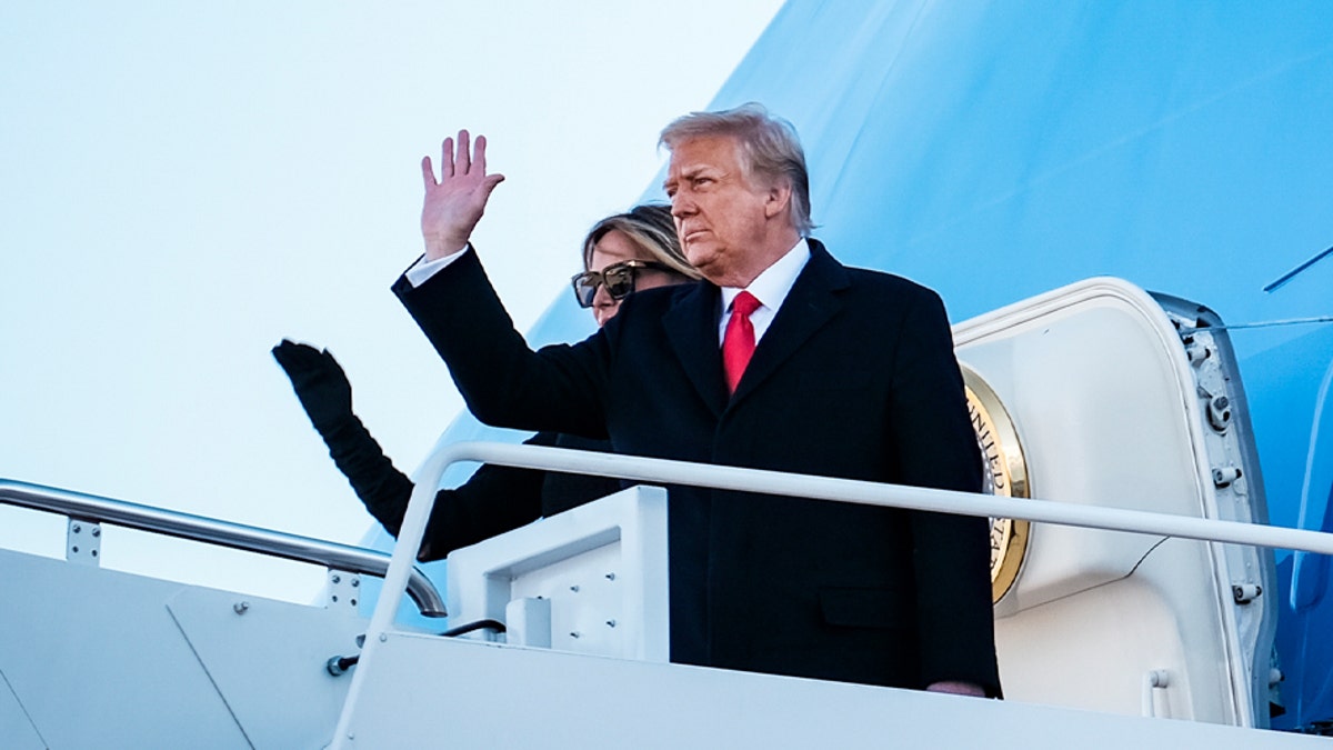 President Donald Trump and first lady Melania Trump board Air Force One at Joint Base Andrews before boarding Air Force One for his last time as president on Jan. 20, 2021, in Joint Base Andrews, Md. (Pete Marovich - Pool/Getty Images)