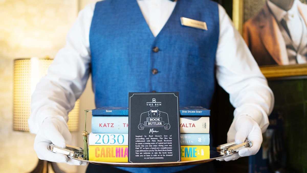 The Ben West Palm's Book Butler will hand deliver a complimentary book to guests as part of its new program, in partnership with The Palm Beach Book Store.