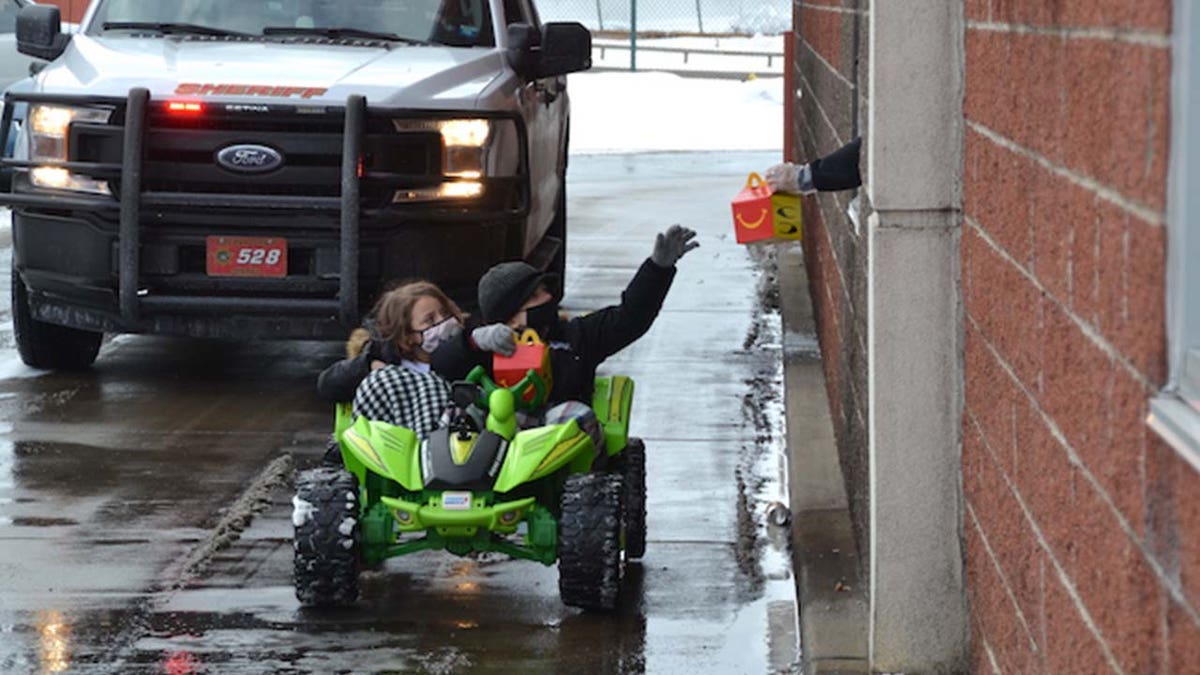 In an iconic shot, Cooper Traxler and Natalee Olsen picked up their cheeseburger Happy Meals from the drive-thru of their local McDonald's on Valentine's Day.