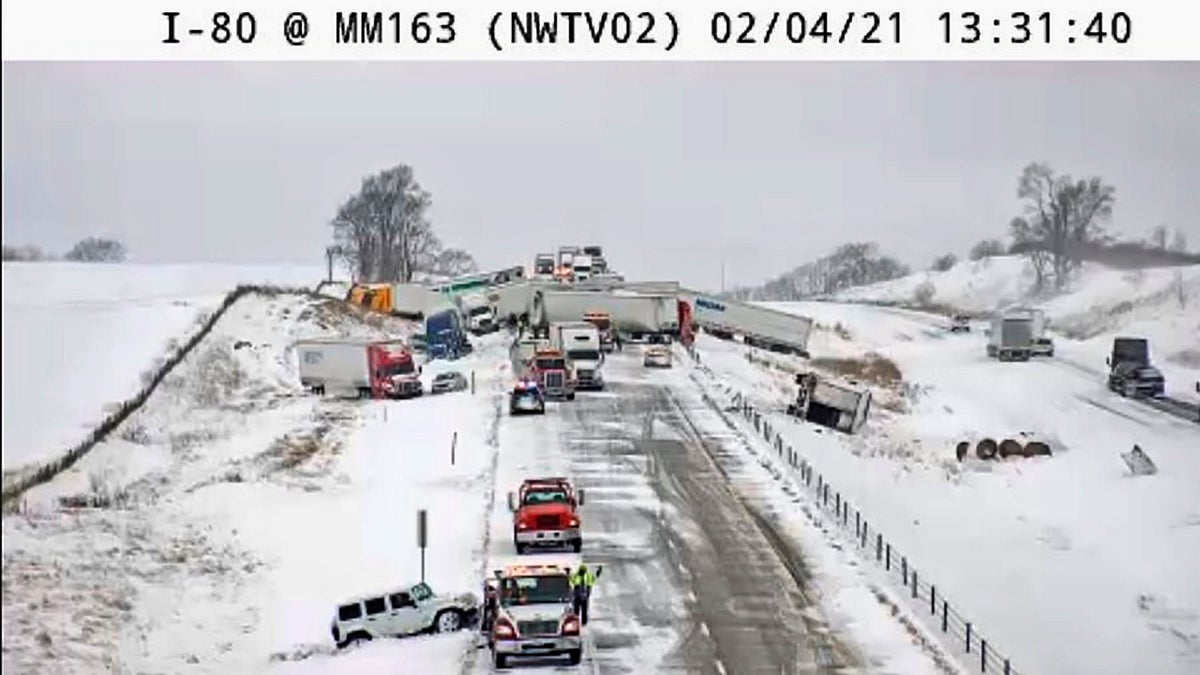 This image provided by the Iowa Transportation Department from a traffic camera shows a massive pileup on Interstate 80 on Thursday, west of Newton. The eastbound lanes of the interstate were closed following the chain-reaction crash, which involved roughly 40 vehicles. (AP/Iowa Transportation Department)