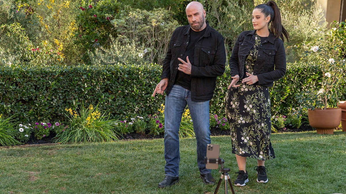 John Travolta and his daughter Ella are featured in Scotts Miracle-Gro's 45-second spot.