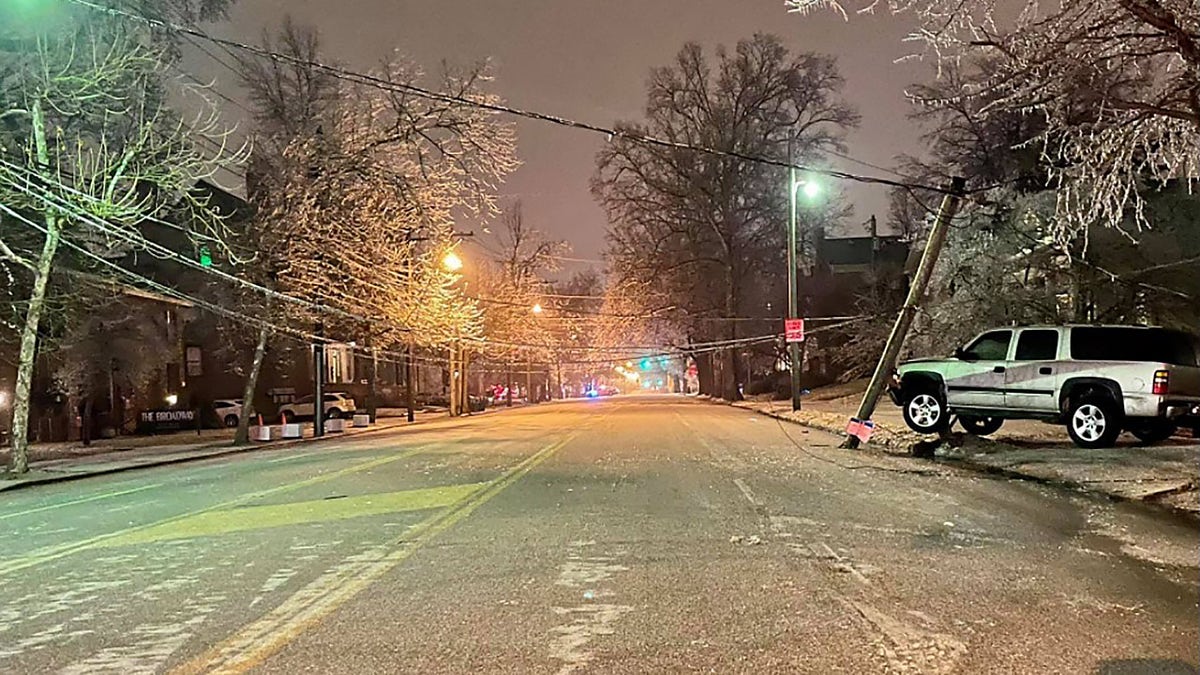 The Lexington Police Department in Kentucky said Thursday that "crews have been busy throughout the night and early morning responding to numerous calls of icy limbs and power lines that have fallen on vehicles and roadways." This image shows where a vehicle struck a pole, police say.