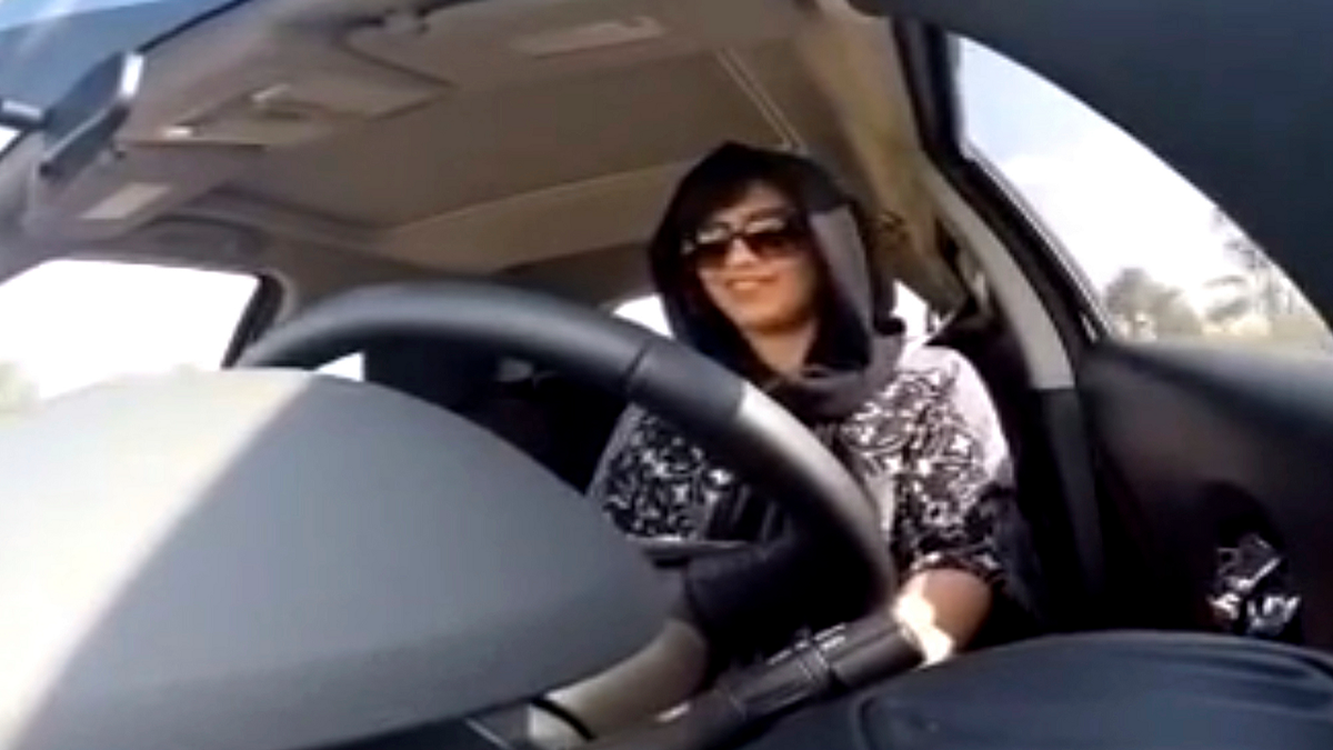 This Nov. 30, 2014, image made from video released by Loujain al-Hathloul shows her driving toward the United Arab Emirates - Saudi Arabia border before her arrest on Dec. 1, 2014, in Saudi Arabia. (AP/Loujain al-Hathloul)