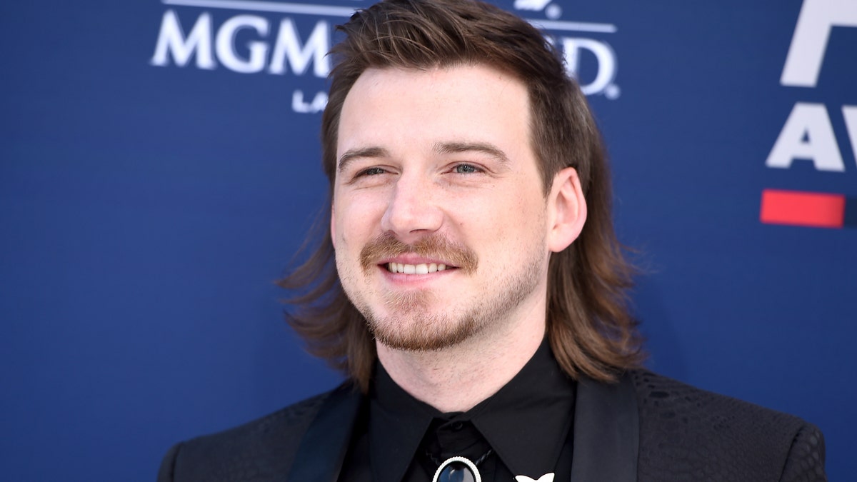 Morgan Wallen's 'Dangerous: The Double Album' has spent its 10th week atop the Billboard 200 chart despite his racial slur scandal. (Photo by Jordan Strauss/Invision/AP, File)