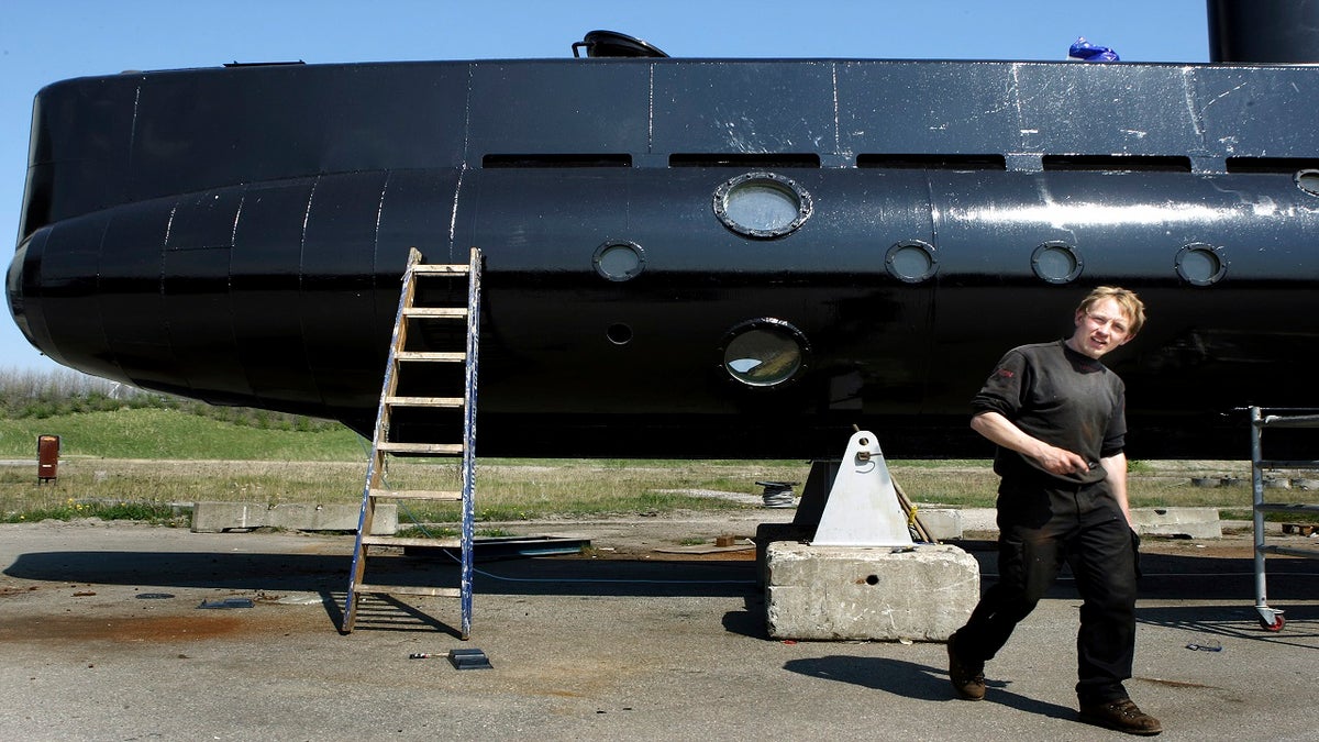 This 2008 file photo, shows Peter Madsen and his submarine. Madsen was sentenced to 21 months Tuesday for his attempt to escape from a suburban Copenhagen prison last year during which he threatened prison staff and police with a fake gun and fake explosives. (AP)