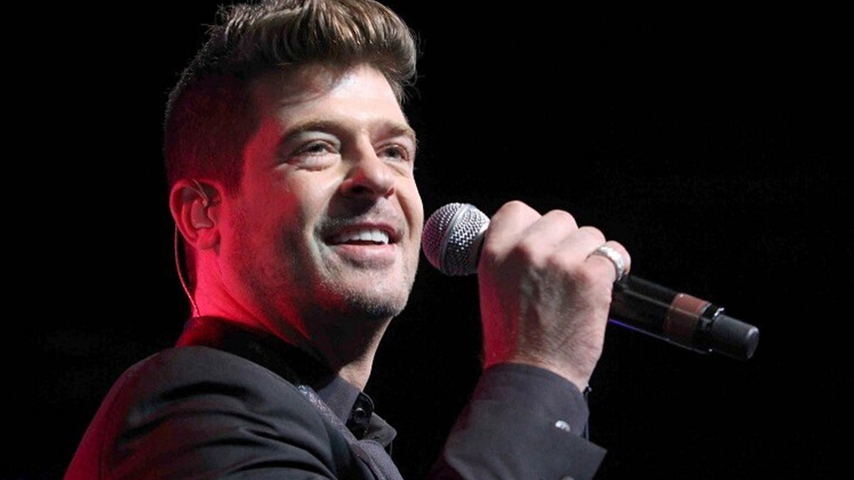 Ahead of his newest album 'On Earth, and in Heaven' release, Robin Thicke opened up about his past struggles.