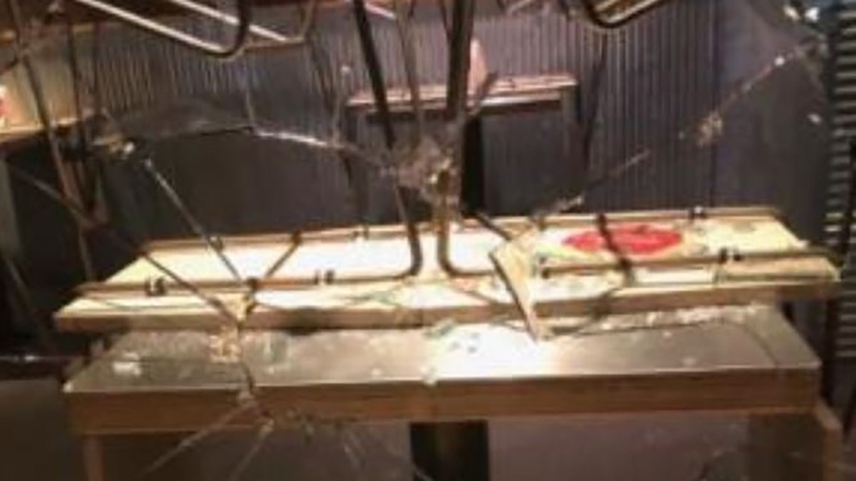 Rioters smashed the window of a restaurant in downtown Portland during a night of destruction Saturday.