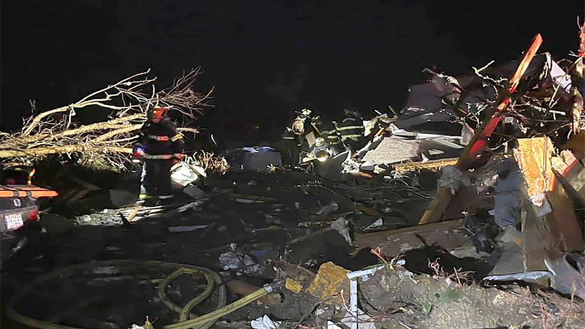 Firefighters respond to a site after a deadly tornado tore through Brunswick County, N.C., on Tuesday. (AP/Brunswick County Sheriff’s Office)