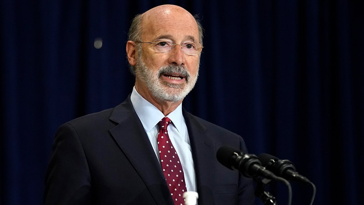FILE - In this Nov. 4, 2020, file photo, Pennsylvania Gov. Tom Wolf speaks during a news conference in Harrisburg, Pa., regarding the counting of ballots in the 2020 general election. Facing a deep, pandemic-inflicted budget deficit, Gov. Wolf will ask lawmakers for billions of dollars funded by higher taxes on Pennsylvania’s huge natural gas industry for workforce development and employment assistance to help the state recover. (AP Photo/Julio Cortez, File)