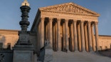 FILE - In this Friday, Nov. 6, 2020 file photo, The Supreme Court is seen at sundown in Washington. The Supreme Court is telling California it can't enforce a ban on indoor church services because of the coronavirus pandemic. The high court issued orders late Friday, Feb. 5, 2021 in two cases where churches had sued over coronavirus-related restrictions in the state. (AP Photo/J. Scott Applewhite, File)