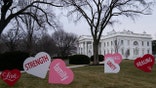 Decorations sit on the North Lawn of the White House, Friday, Feb. 12, 2021, in Washington. (AP Photo/Evan Vucci)