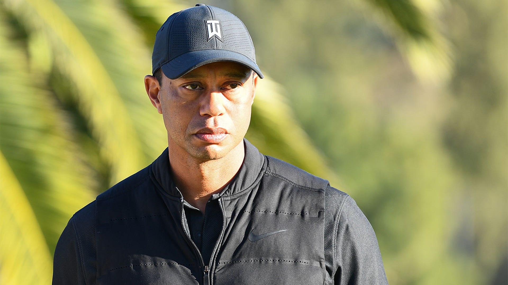 PACIFIC PALISADES, CA : Tiger Woods looks on from the 18th hole during the final round of The Genesis Invitational golf tournament at the Riviera Country Club in Pacific Palisades, CA on February 21, 2021. (Photo by Brian Rothmuller/Icon Sportswire via Getty Images)