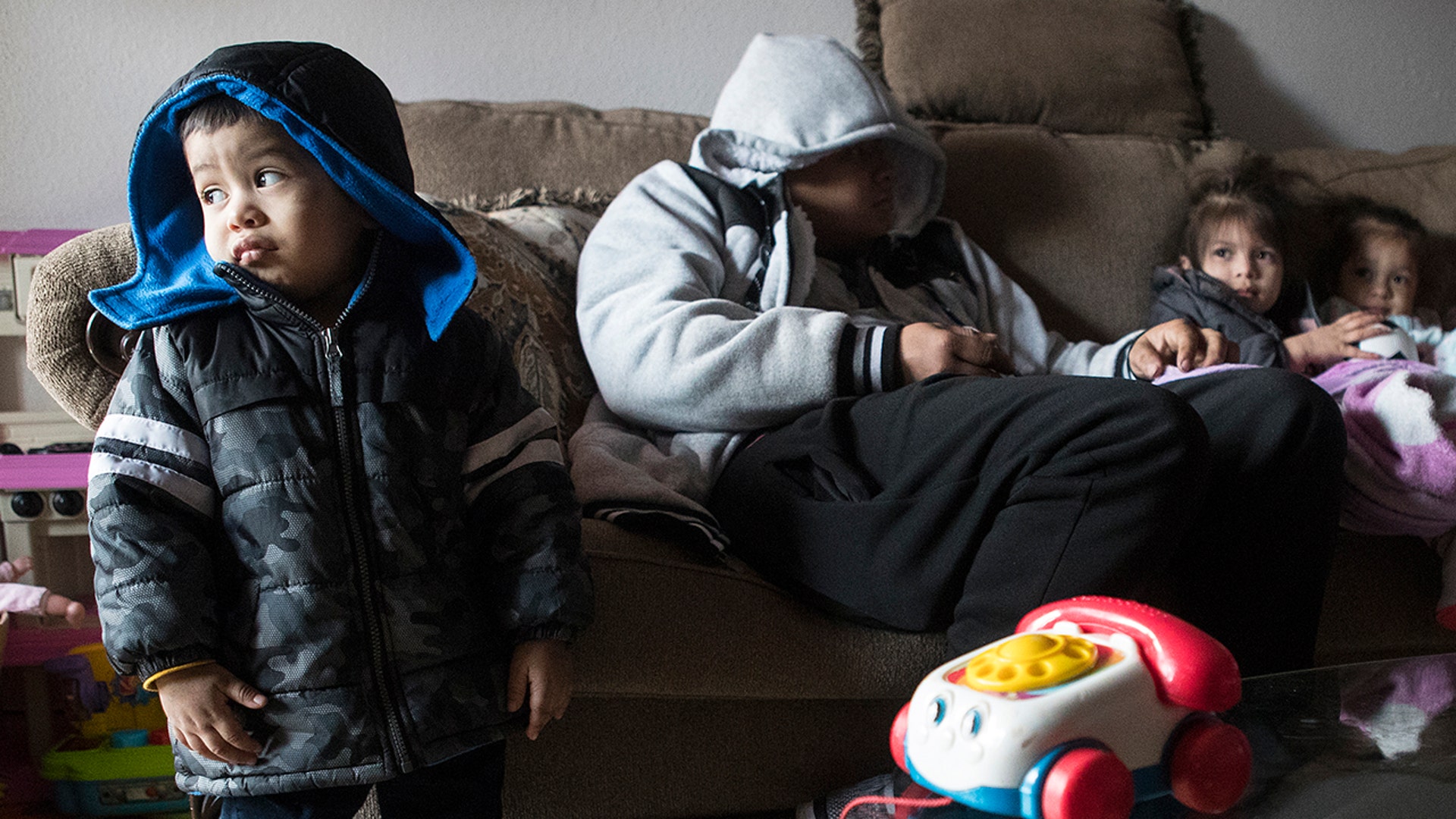Eithan Colindres wears a winter coat inside after the apartment his family lives in the Greenspoint area that lost power following an overnight snowfall Monday, Feb. 15, 2021 in Houston. Temperatures plunged into the teens Monday with light snow and freezing rain.