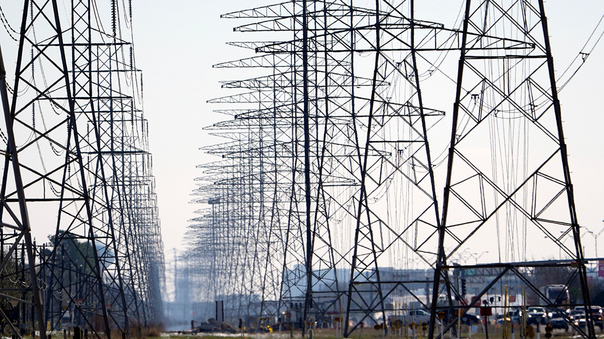 Power lines on Tuesday, Feb. 16, 2021, in Houston. More than 4 million people in Texas still had no power a full day after historic snowfall and single-digit temperatures created a surge of demand for electricity to warm up homes unaccustomed to such extreme lows, buckling the state's power grid and causing widespread blackouts