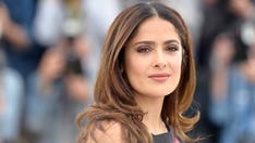 Salma Hayek shares Sunday morning beach photo in a purple one-piece
