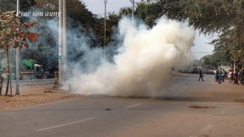 Burma protest against military coup leaves at least 2 dead, dozens injured