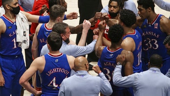 Kansas' record Top 25 run over; Michigan jumps to No. 3