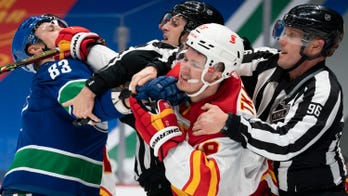 Flames hand Canucks 6th straight loss in series opener