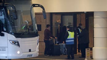 UK opens quarantine hotels, pushes on with vaccine drive