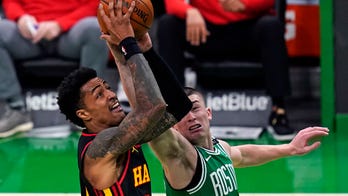Young scores 40, Hawks end skid, slip by Celtics 122-114