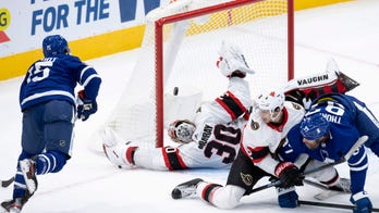 NHL-leading Maple Leafs beat last-place Senators 2-1