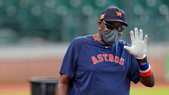 Astros' Baker gets COVID-19 vaccine after initial reticence