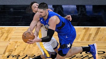 Vucevic has triple-double, Magic rally to beat Warriors