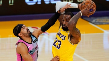 Heat hold off depleted Lakers 96-94 in NBA Finals rematch