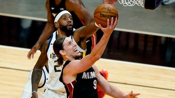 Butler, Dragic carry Heat past NBA-best Jazz, 124-116