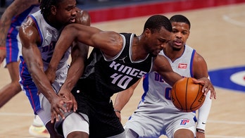 Kings snap skid, top Pistons 110-107 in strange finish