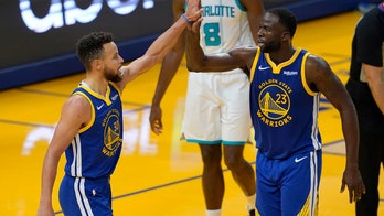Green notches triple-double, Warriors avenge loss to Hornets