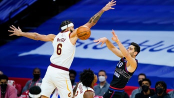 Sexton, Garland help Cavaliers upset 76ers 112-109 in OT