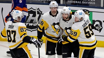 Letang scores late in OT, Penguins beat Islanders 4-3