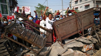 Burma descends into chaos after military coup, at least 18 protesters killed