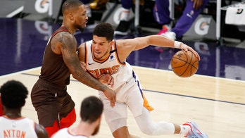 Booker scores 34, Suns roll to 132-100 win over Blazers