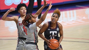 Wells, No. 5 Texas A&M pull away from Ole Miss, 66-55