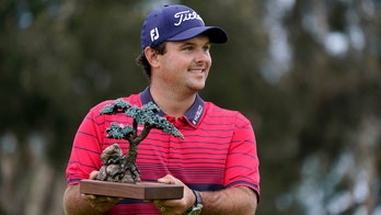 Day after rules controversy, Reed wins at Torrey Pines