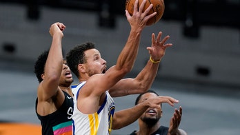 Curry leads Warriors to 114-91 victory, ending Spurs' streak