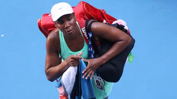 Venus finishes Australian Open loss on injured ankle, knee